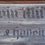 Firmenschild: "Erwin M&uuml;ller - S&auml;ge- und Hobelwerk" (2,34 x 1,05 Meter) am S&auml;gewerk-Turm in L&uuml;chow (Wendland) bis 1998